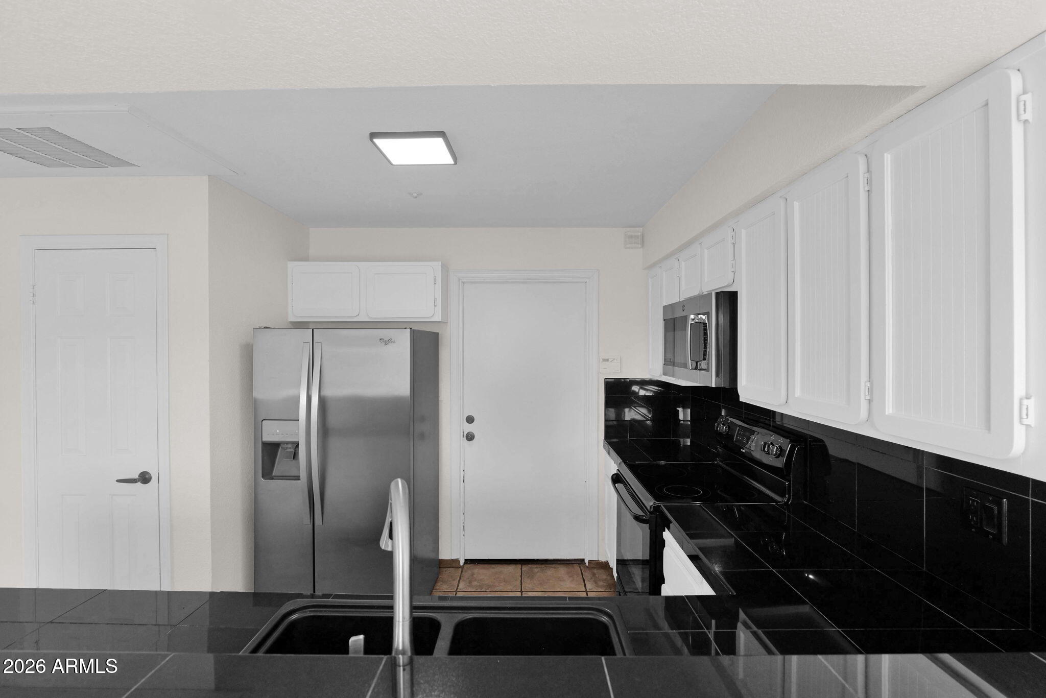 1124 East Rose Lane, Unit 3 Phoenix, AZ 85014 - Photo 11 of 37 a view of entryway with wooden floor