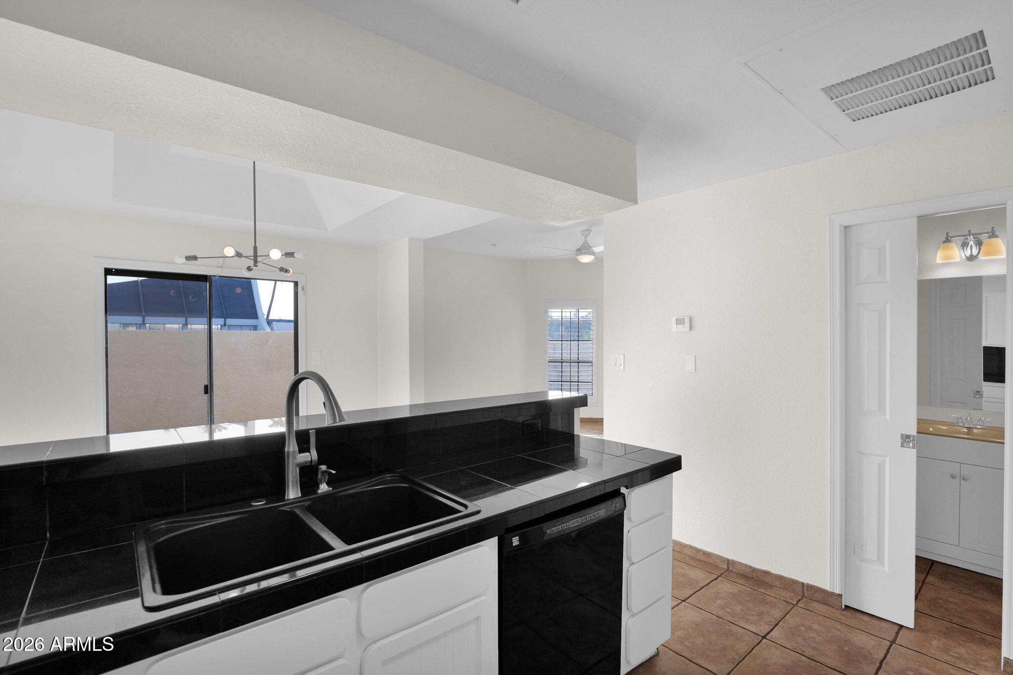 1124 East Rose Lane, Unit 3 Phoenix, AZ 85014 - Photo 14 of 37 a close view of a sink a counter space and utility room