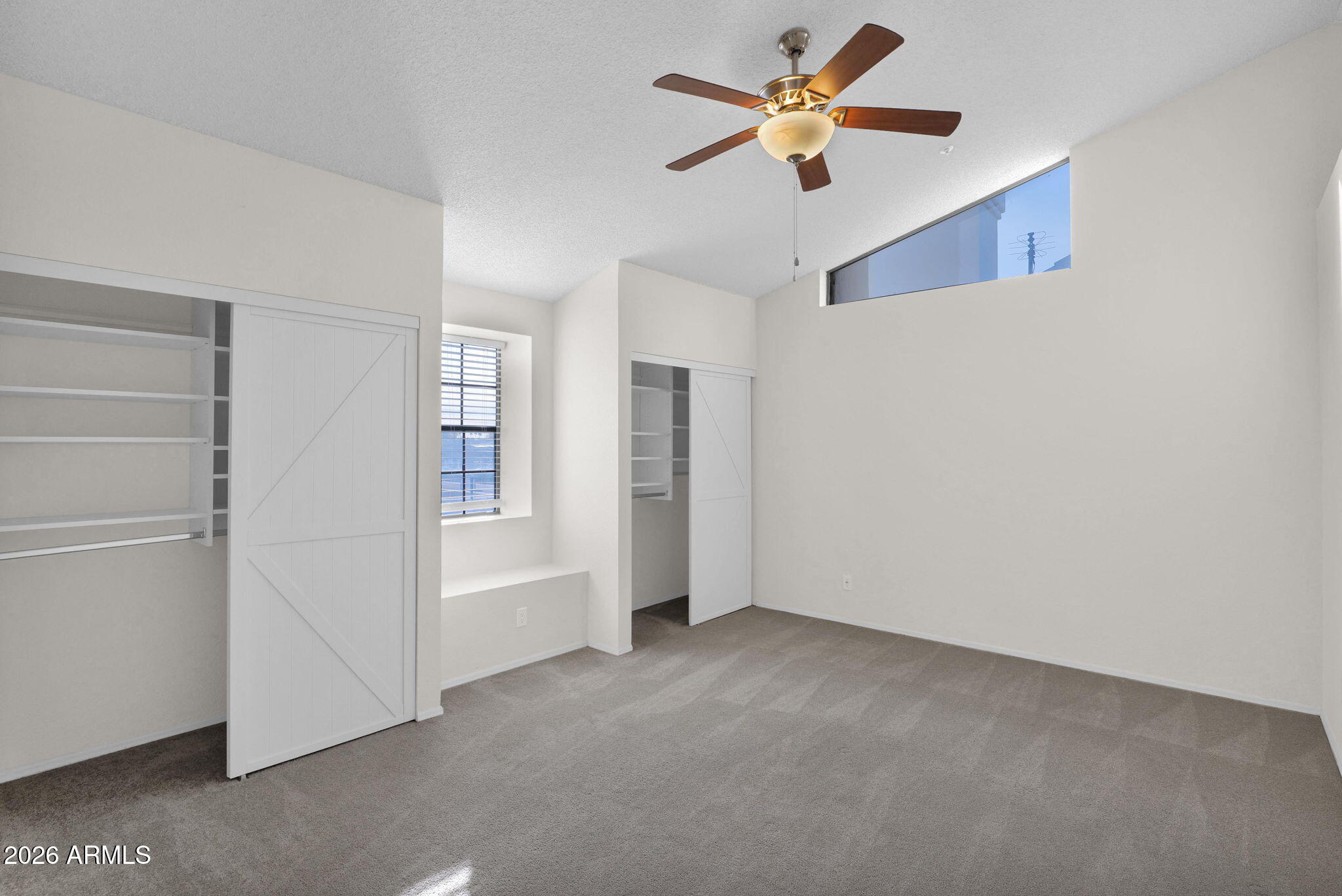 1124 East Rose Lane, Unit 3 Phoenix, AZ 85014 - Photo 18 of 37 a view of an empty room with a window