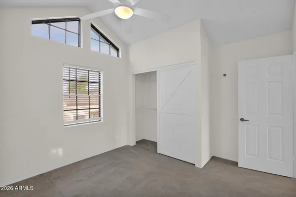 an empty room with windows