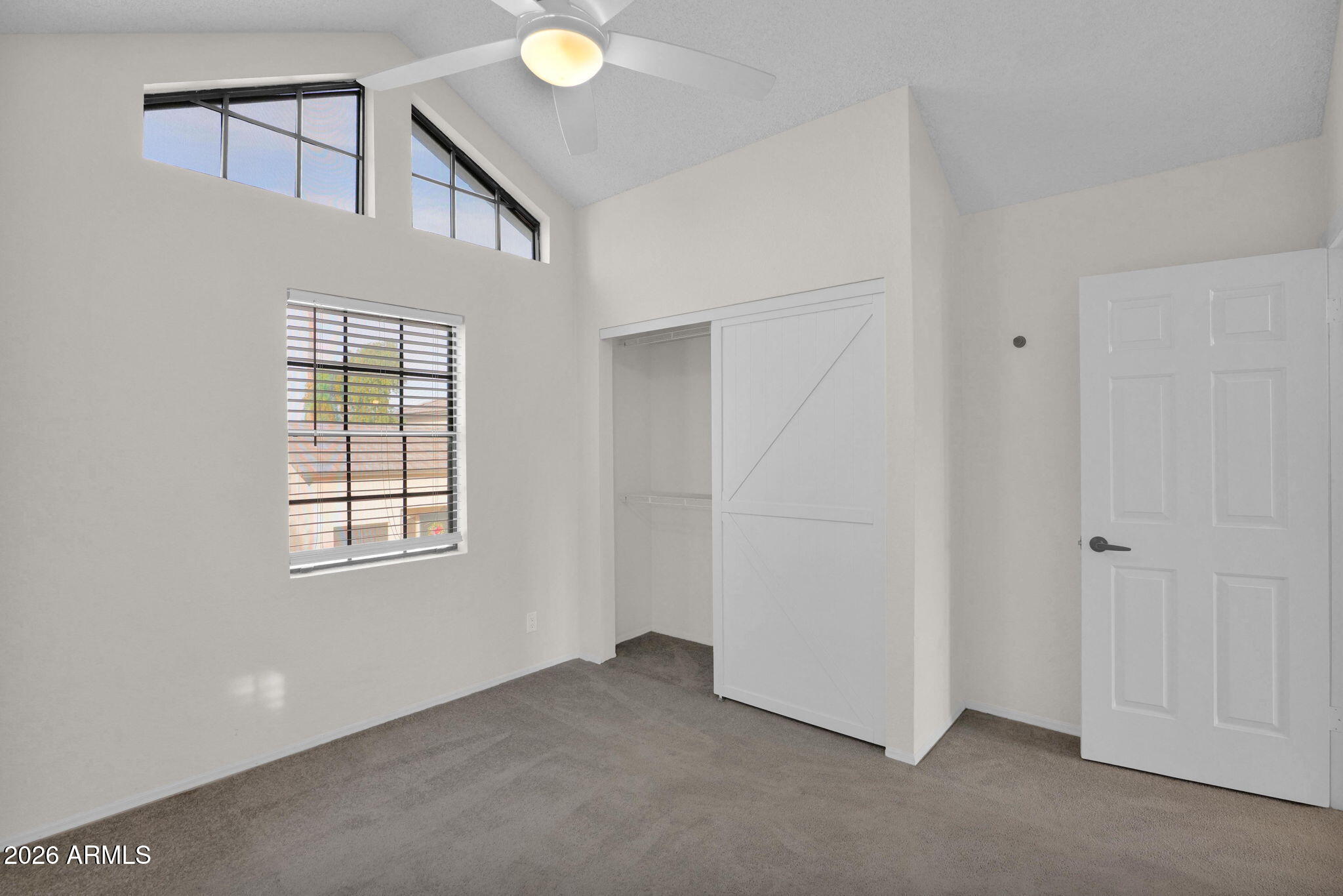 1124 East Rose Lane, Unit 3 Phoenix, AZ 85014 - Photo 25 of 37 an empty room with windows