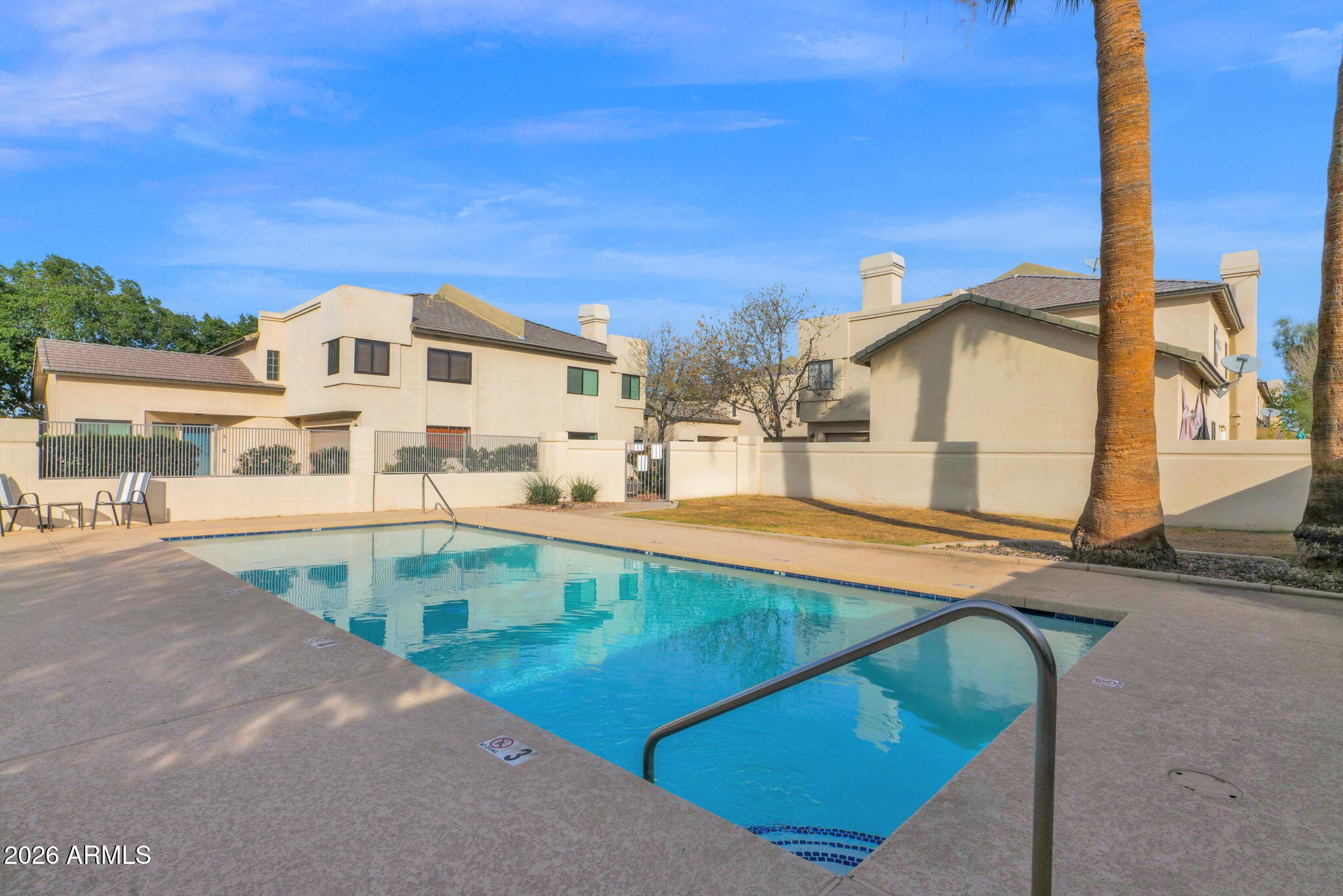 1124 East Rose Lane, Unit 3 Phoenix, AZ 85014 - Photo 36 of 37 a view of a house with pool