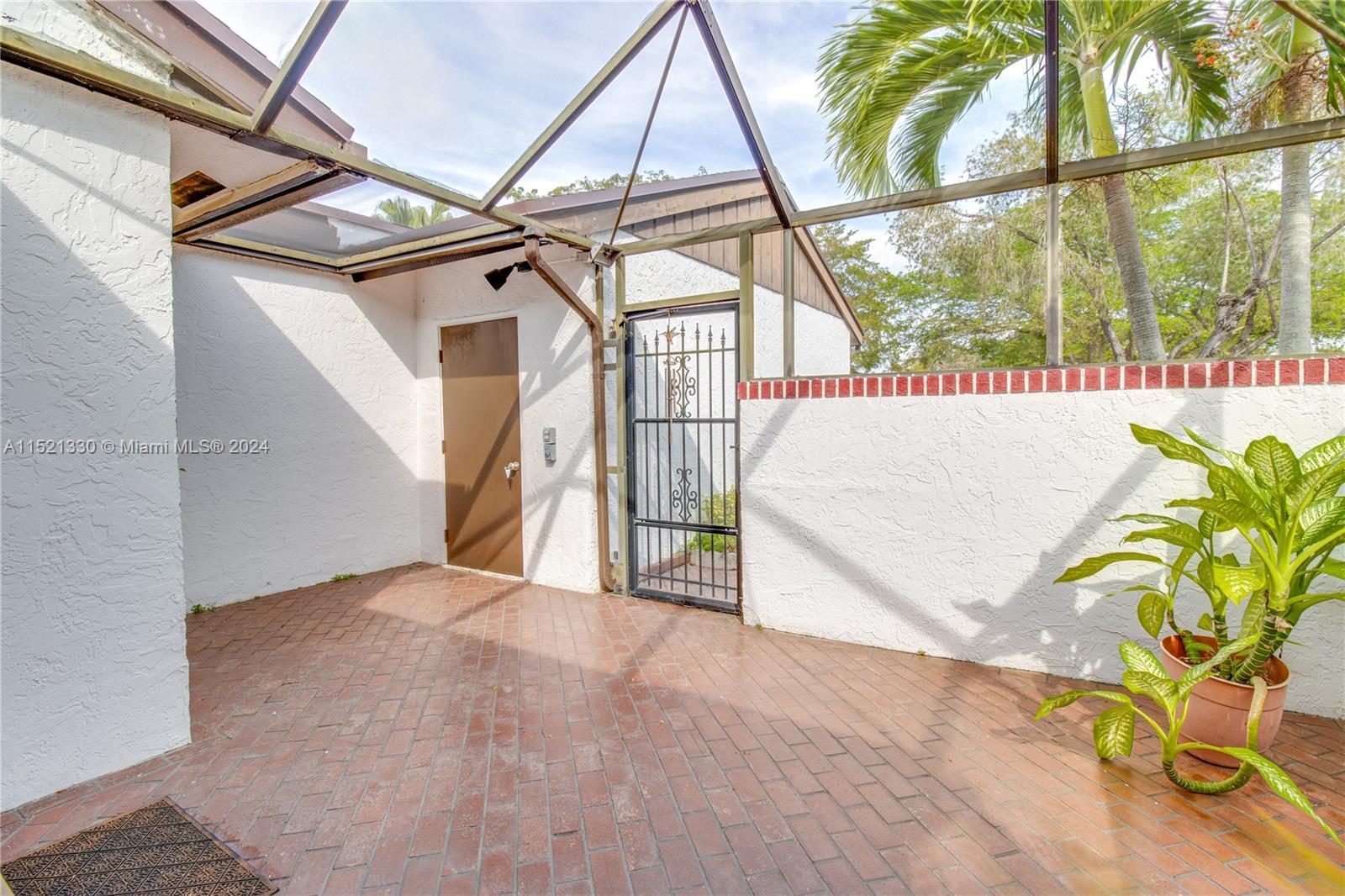 6343 Pinehurst Circle, Unit D36 Tamarac, FL 33321 - Photo 3 of 13 a view of outdoor space and deck