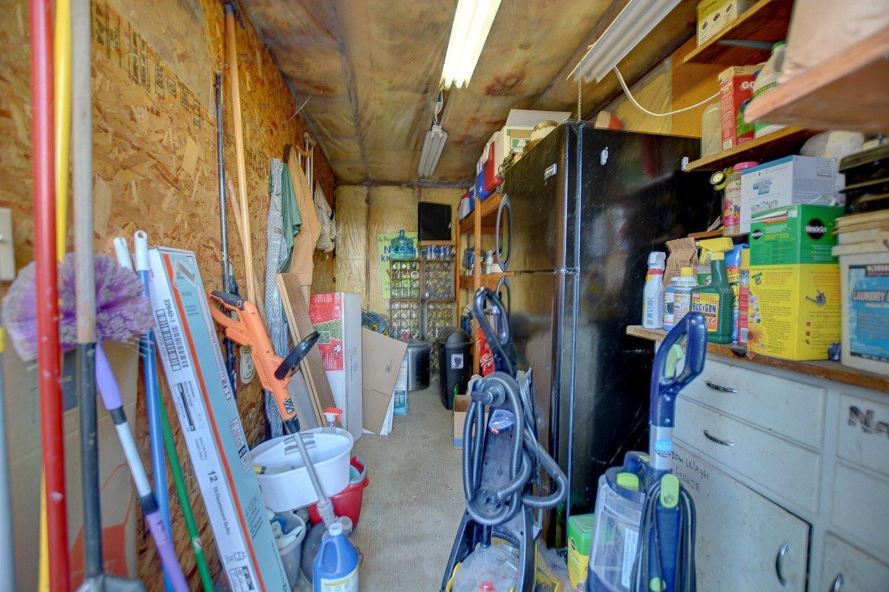 8684 Wagner Creek Road Talent, OR 97540 - Photo 22 of 78 a view of walk in closet with clothes