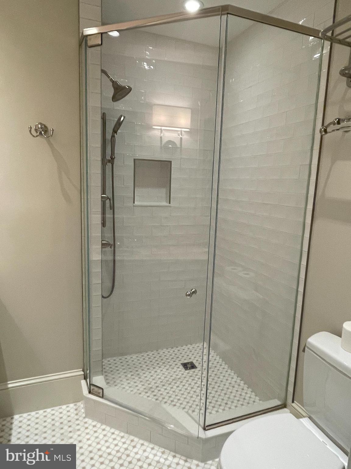 2802 P Street Northwest Washington, DC 20007 - Photo 25 of 58 a bathroom with a shower and toilet
