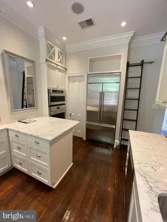 a bathroom with a shower and toilet