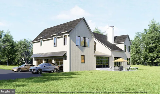 a view of a house with a yard and sitting area