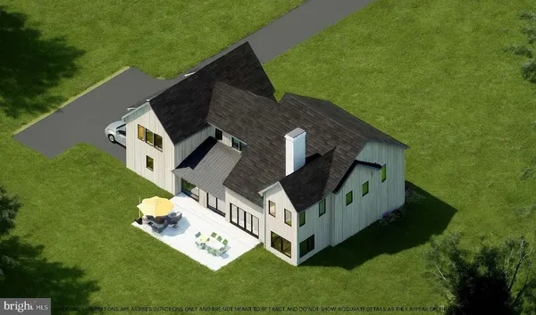 aerial view of a house with a yard