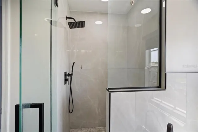 a view of storage and utility room with racks on the wall