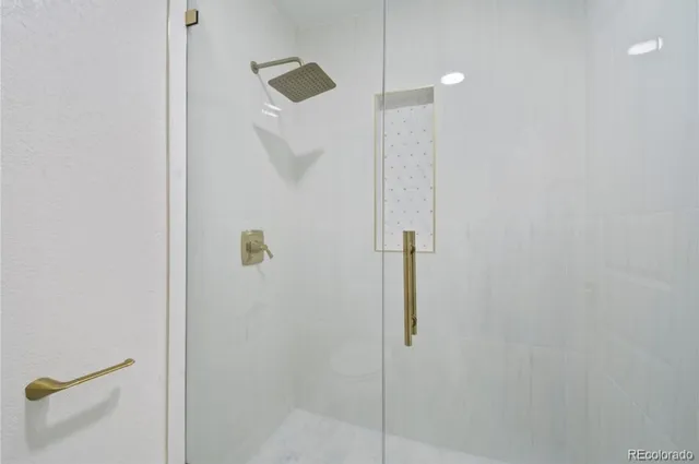 an empty room with a empty space and windows