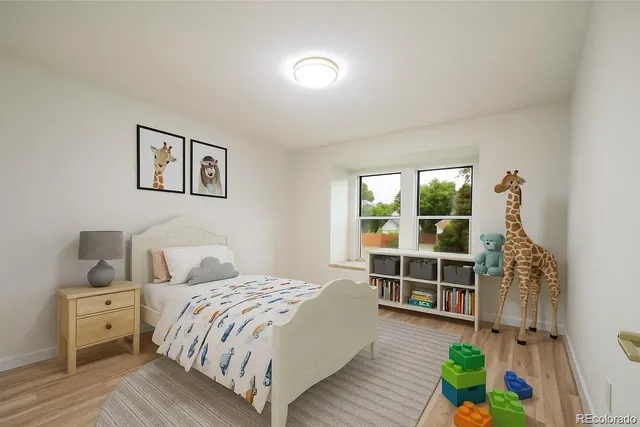 a bathroom with a toilet sink and shower