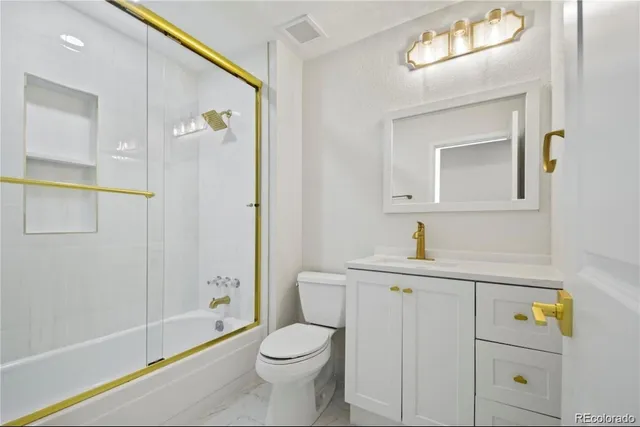 a room with gym equipment and a view of a window