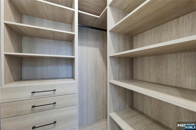 a view of kitchen with furniture and a window