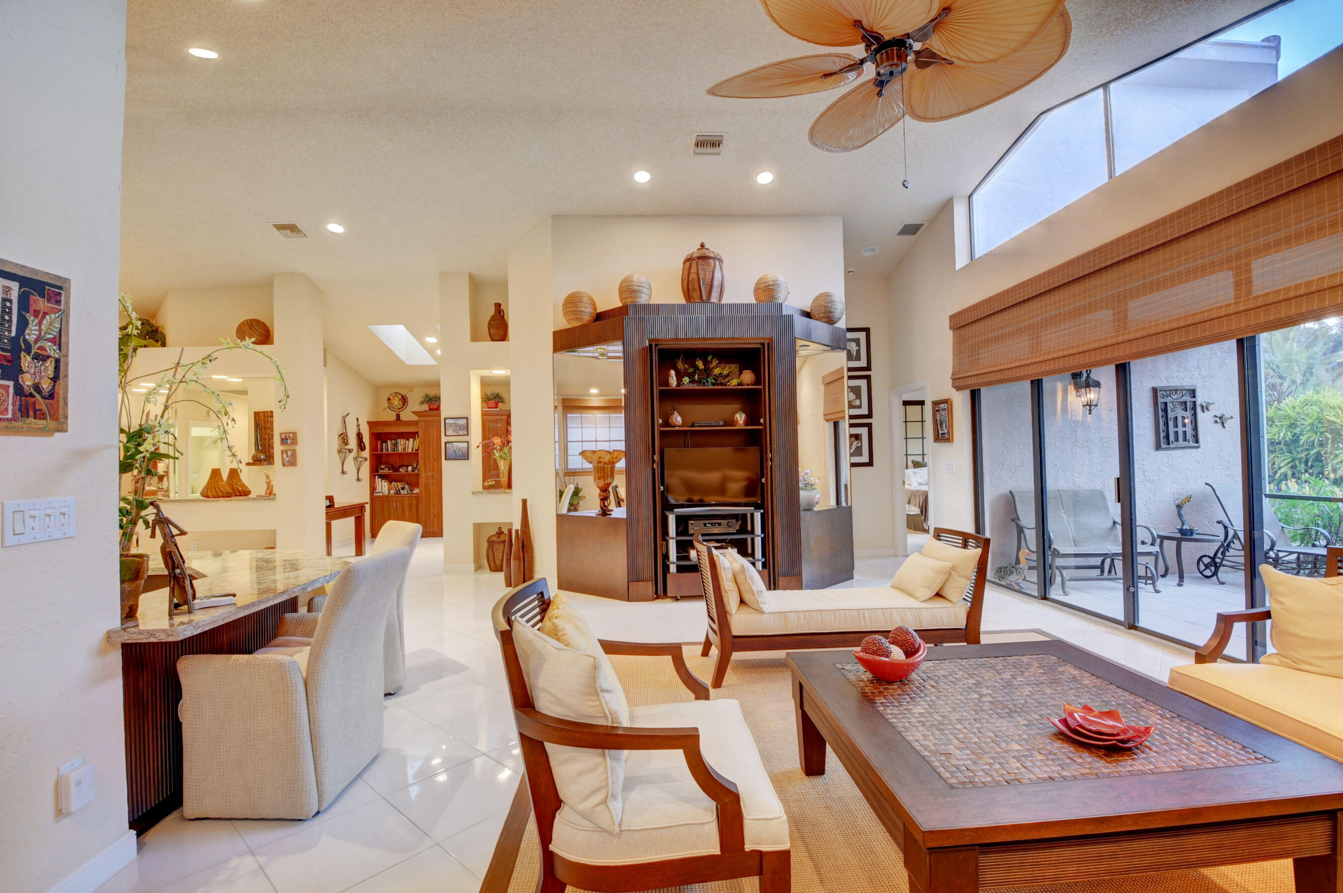 2187 Northwest 59th Street Boca Raton, FL 33496 - Photo 11 of 45 a dining room with furniture and wooden floor