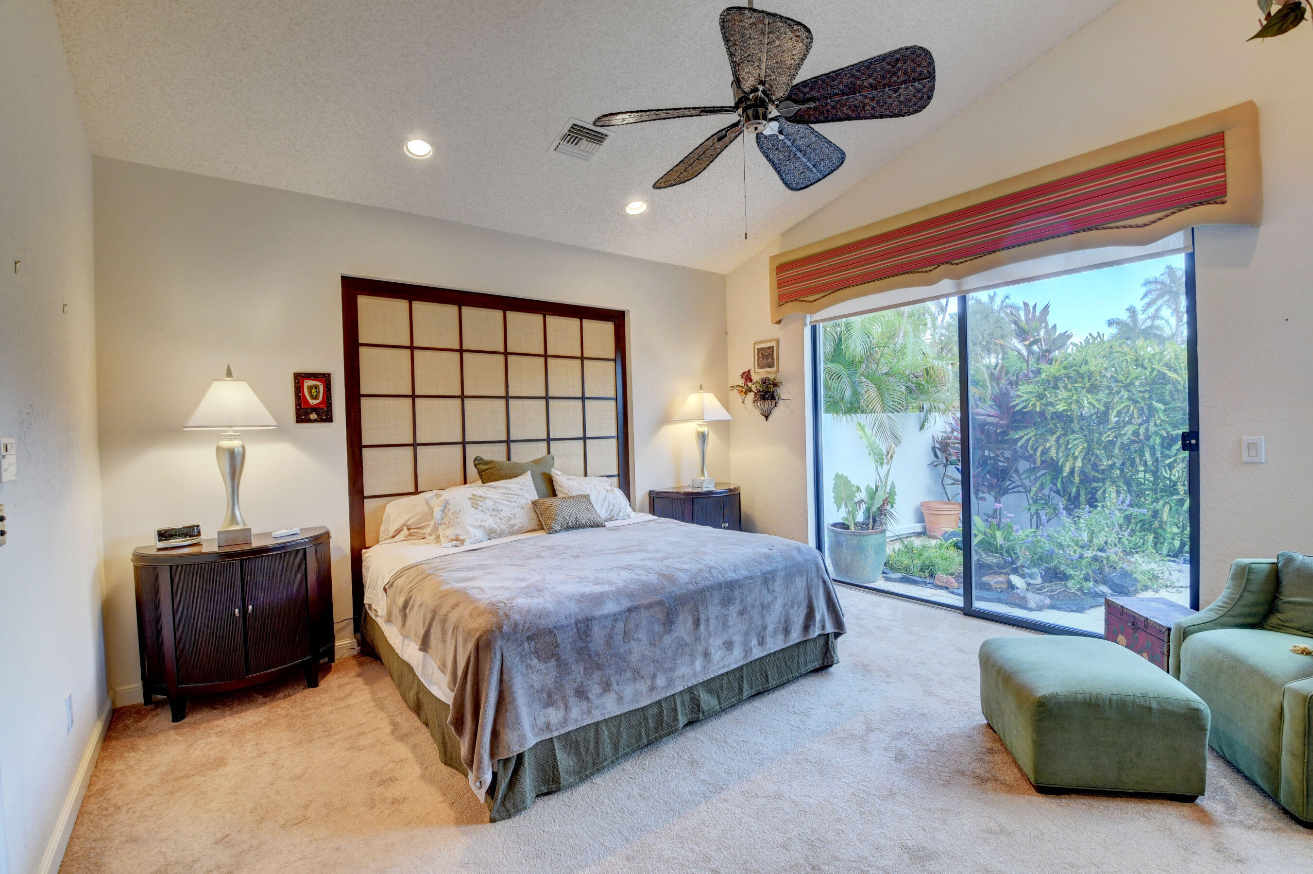 2187 Northwest 59th Street Boca Raton, FL 33496 - Photo 18 of 45 a bedroom with a bed couch and window