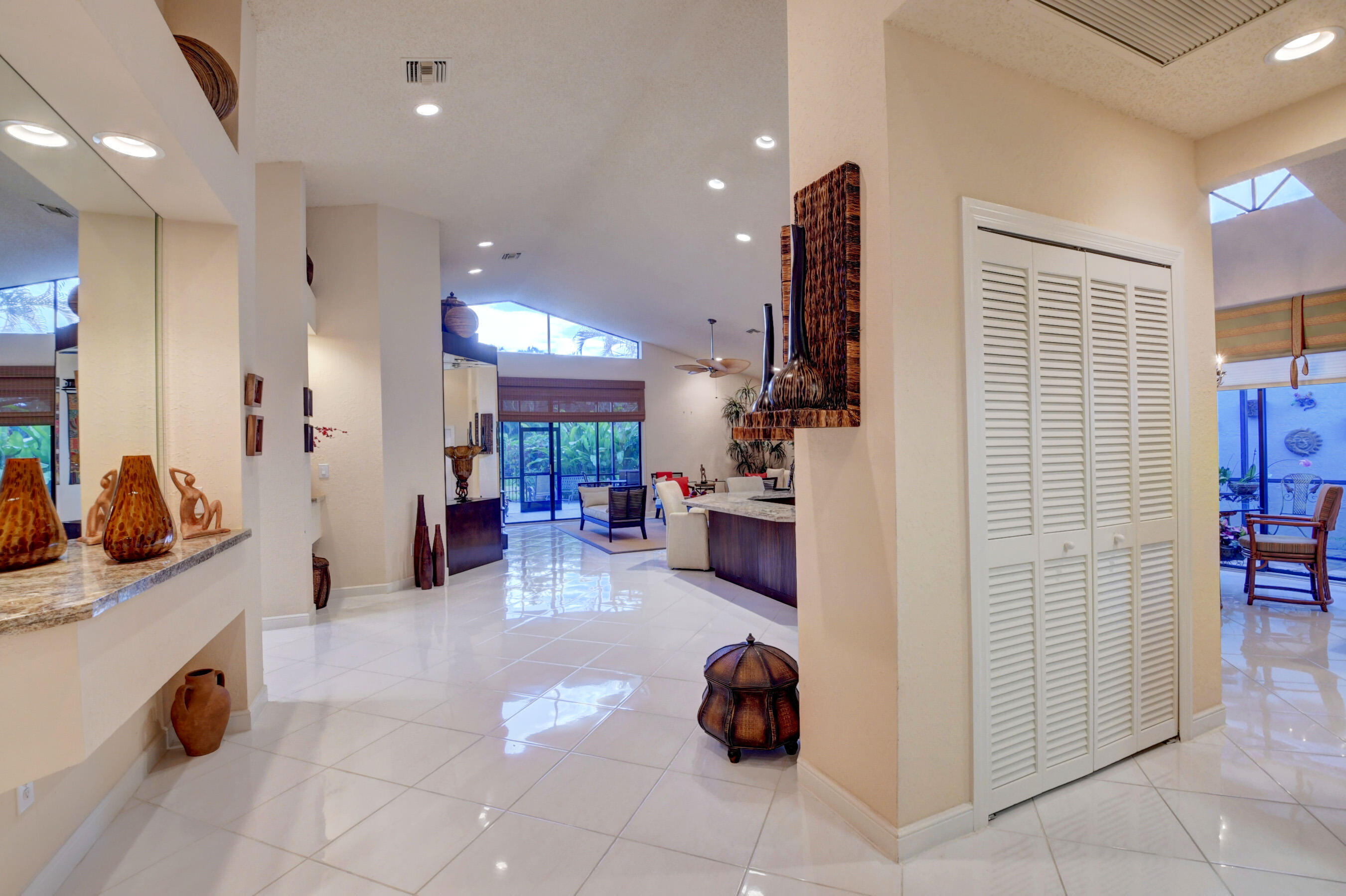 2187 Northwest 59th Street Boca Raton, FL 33496 - Photo 2 of 45 a view of a kitchen with furniture and a kitchen