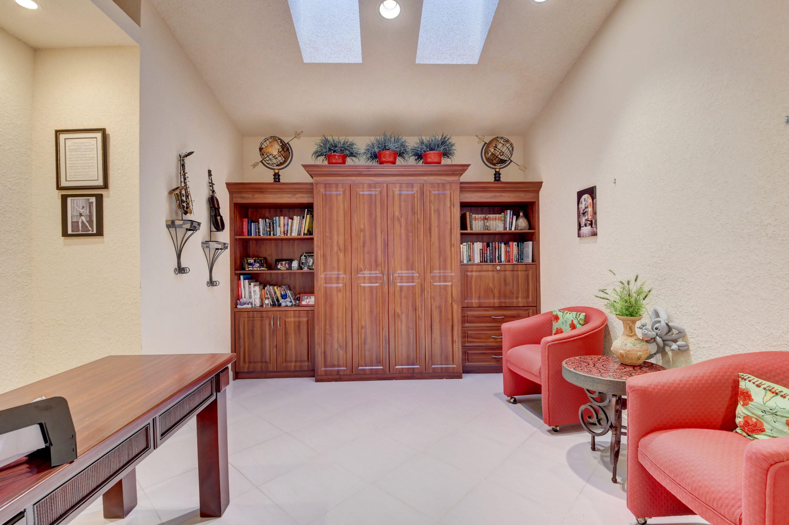 2187 Northwest 59th Street Boca Raton, FL 33496 - Photo 25 of 45 a room with furniture and air hockey table