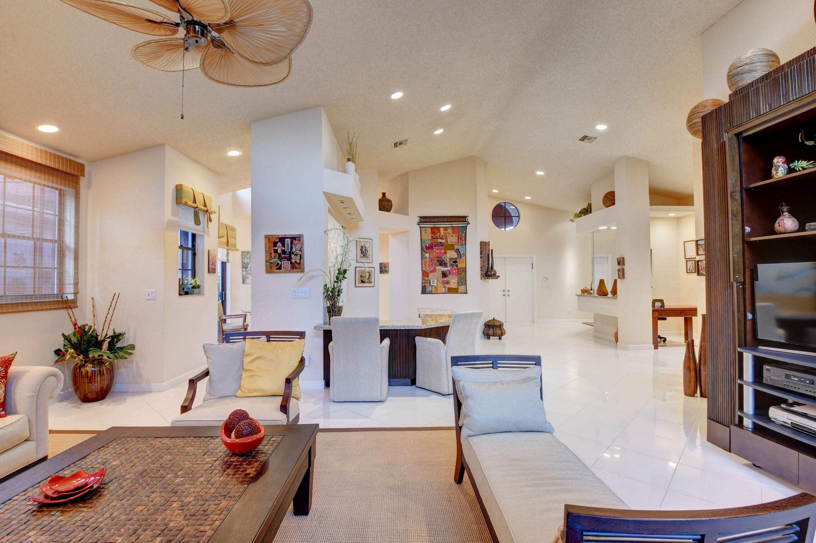 2187 Northwest 59th Street Boca Raton, FL 33496 - Photo 10 of 45 a living room with furniture and a wooden floor