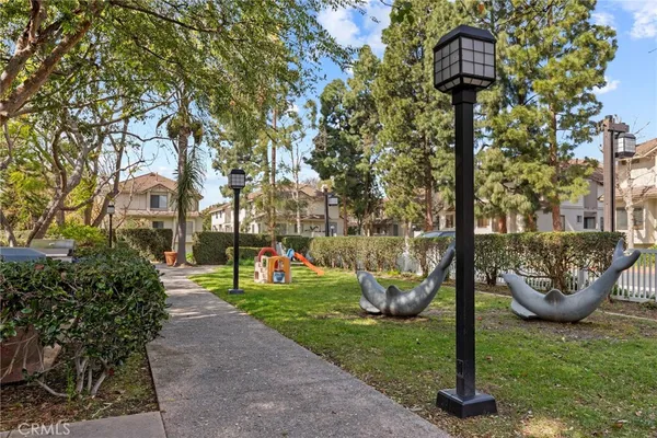 a park view with sitting space and trees