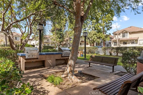 a view of swimming pool and outdoor seating