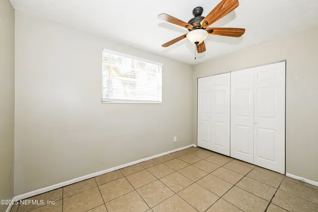 a bathroom with a sink toilet a mirror and shower