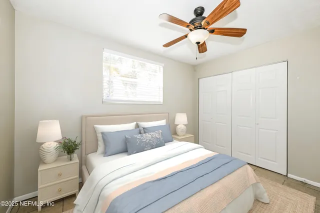 a bathroom with a sink toilet a mirror and shower