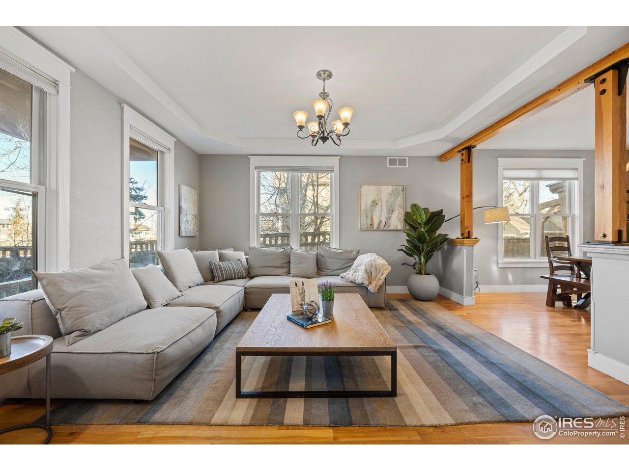 1780 Baseline Road Boulder, CO 80302 - Photo 5 of 31 a living room with furniture and a chandelier