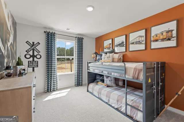 a swimming pool with outdoor seating and yard