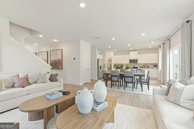 an aerial view of a house with outdoor space