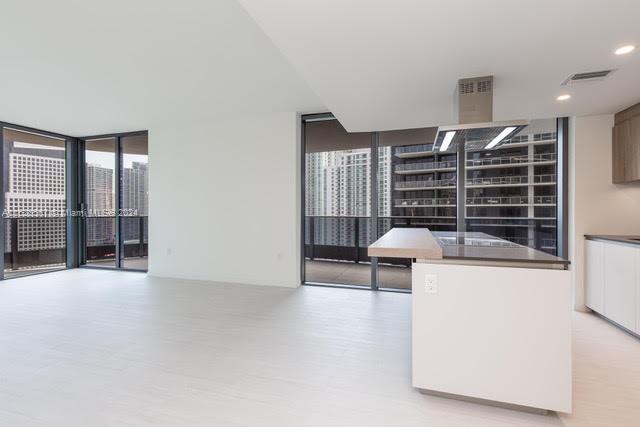 1000 Brickell Plaza, Unit 4015 Miami, FL 33131 - Photo 3 of 29 a view of livingroom with furniture and window