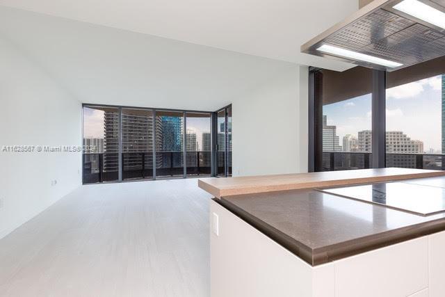 1000 Brickell Plaza, Unit 4015 Miami, FL 33131 - Photo 4 of 29 a view of an empty room with a balcony
