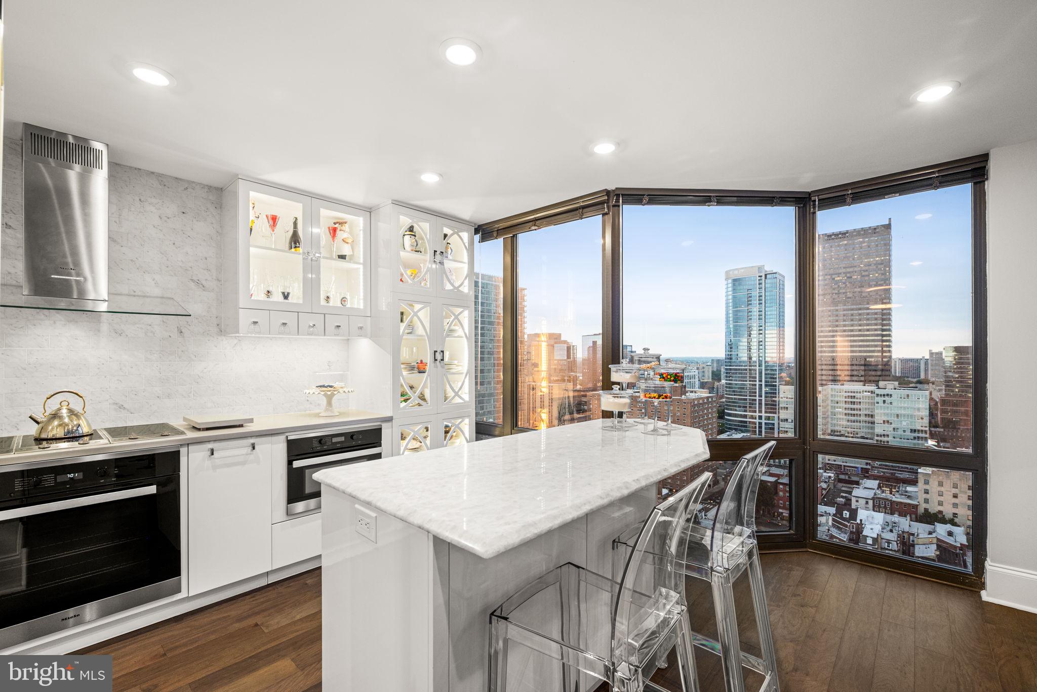 2020 Walnut Street, Unit 25B Philadelphia, PA 19103 - Photo 2 of 42 a kitchen with a stove a sink and a refrigerator