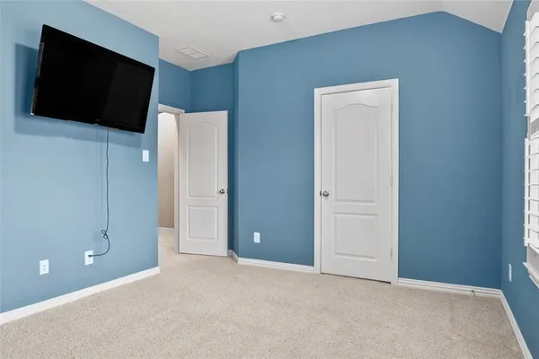 a bathroom with a sink toilet vanity and tub
