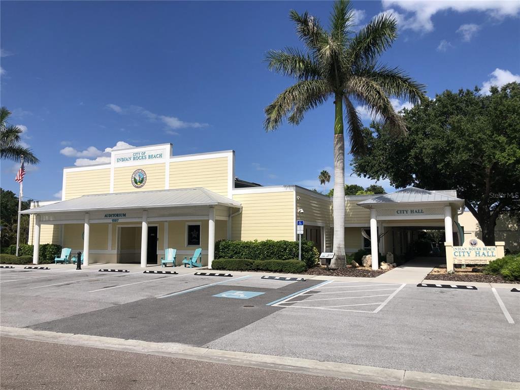 1500 Gulf Boulevard, Unit 103B Indian Rocks Beach, FL 33785 - Photo 53 of 58 a front view of a building with street view