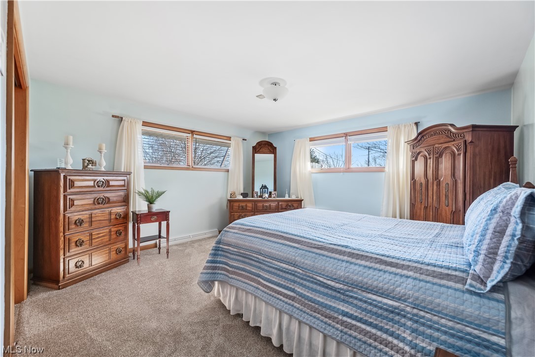 22814 Buck Road Alliance, OH 44601 - Photo 6 of 17 Carpeted bedroom featuring a closet