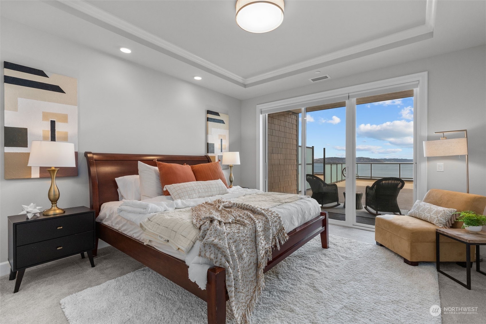 4907 Main Street, Unit 508 Tacoma, WA 98407 - Photo 14 of 40 a bedroom with bed and large windows