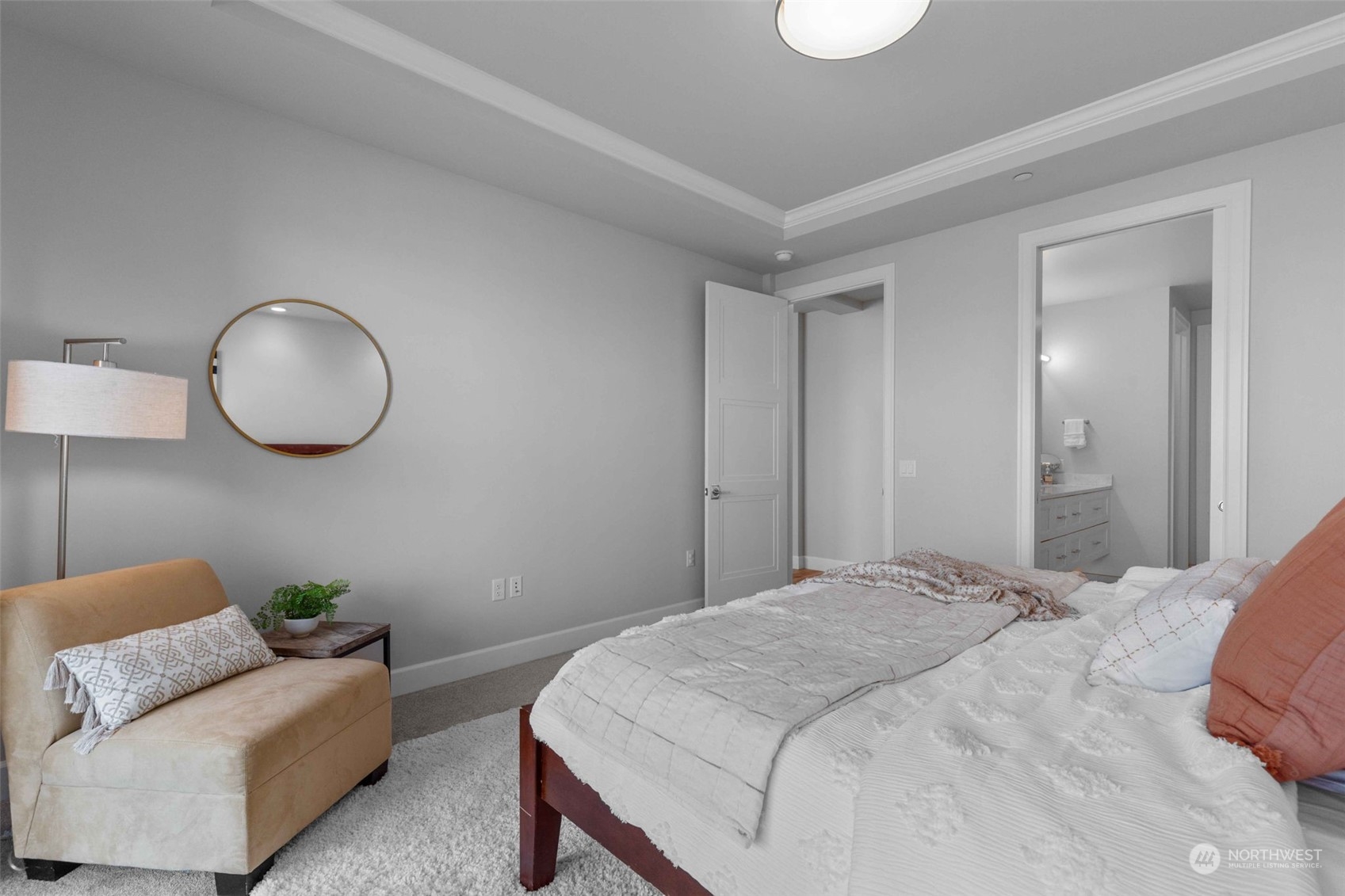 4907 Main Street, Unit 508 Tacoma, WA 98407 - Photo 16 of 40 a bedroom with a bed and a lamp