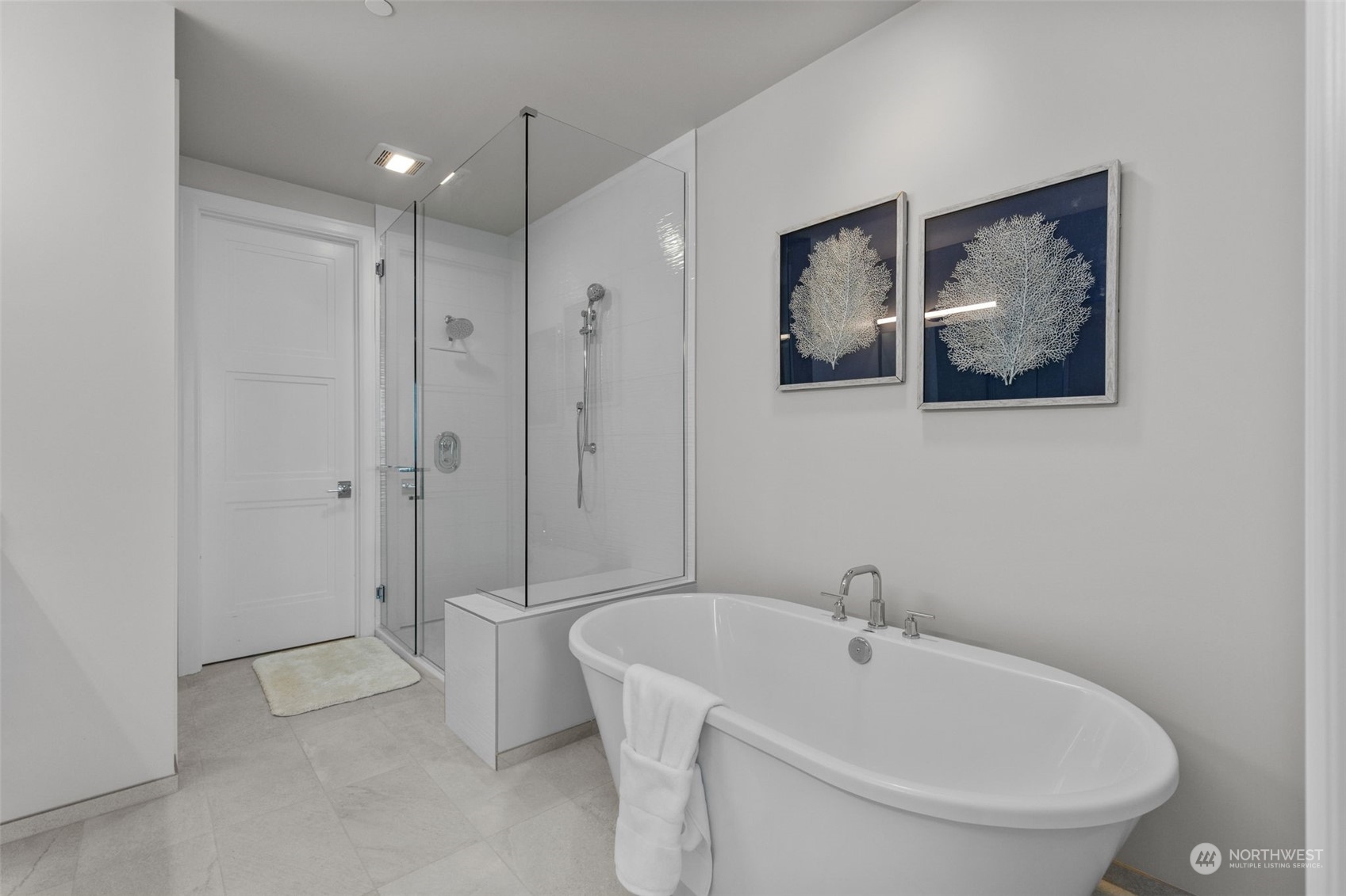 4907 Main Street, Unit 508 Tacoma, WA 98407 - Photo 17 of 40 a white bath tub sitting next to a white toilet