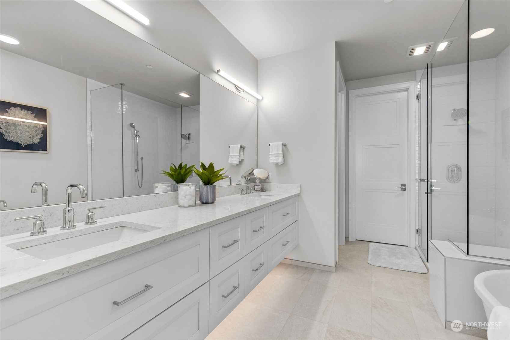 4907 Main Street, Unit 508 Tacoma, WA 98407 - Photo 18 of 40 a bathroom with a double vanity sink toilet and shower