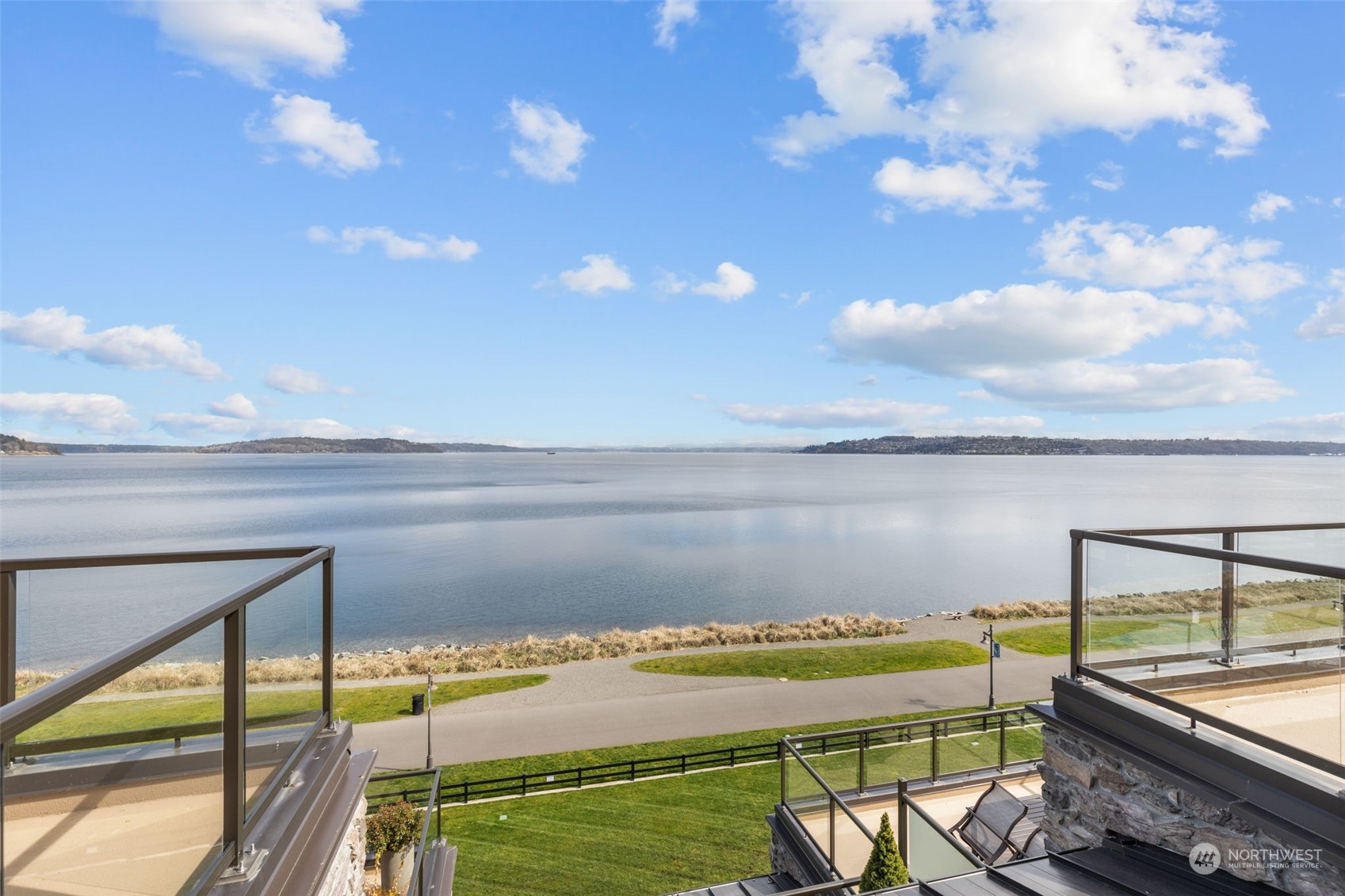 4907 Main Street, Unit 508 Tacoma, WA 98407 - Photo 28 of 40 a view of a balcony with an ocean view