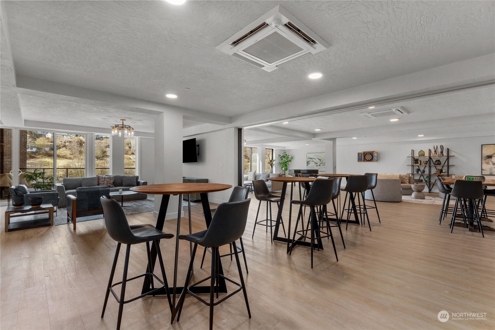 4907 Main Street, Unit 508 Tacoma, WA 98407 - Photo 33 of 40 a view of a dining room with furniture and wooden floor