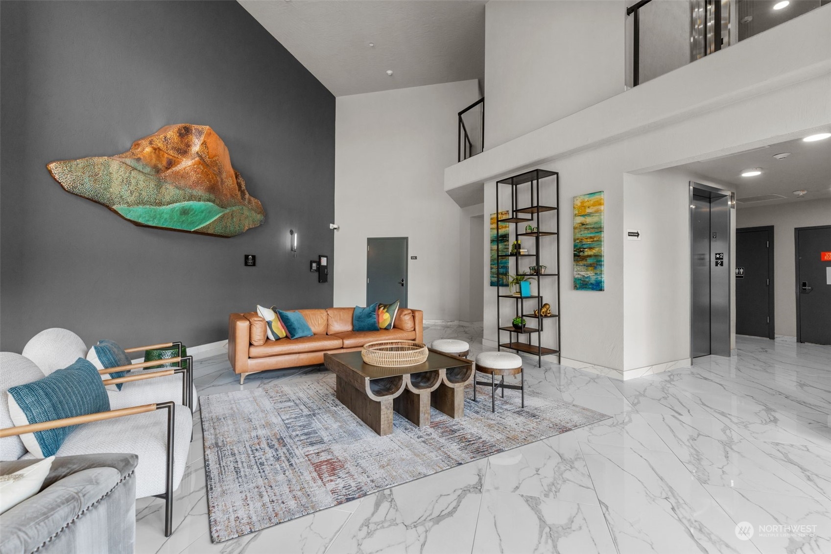 4907 Main Street, Unit 508 Tacoma, WA 98407 - Photo 35 of 40 a living room with furniture a wooden floor and next to a window
