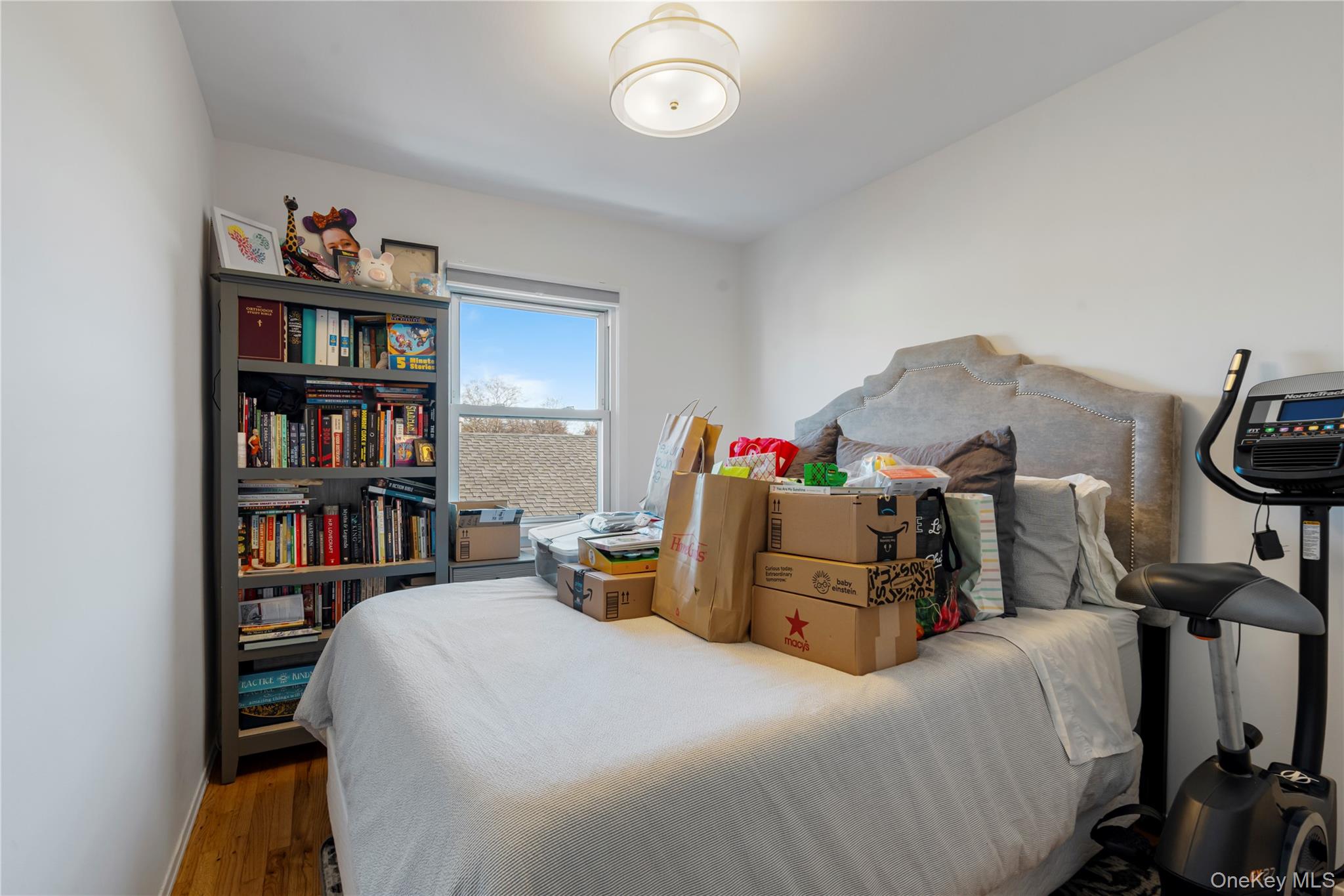 208-48 15th Road, Unit 2 Queens, NY 11360 - Photo 15 of 23 Bedroom with wood finished floors and baseboards