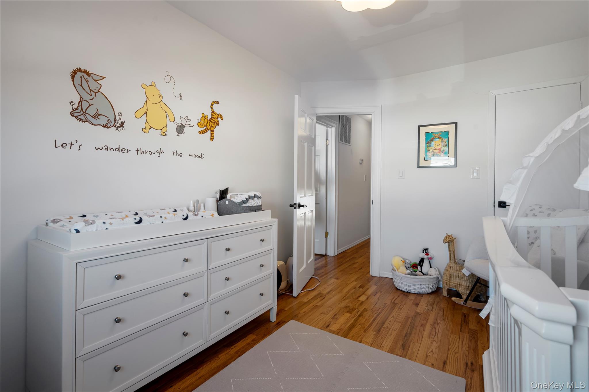 208-48 15th Road, Unit 2 Queens, NY 11360 - Photo 22 of 23 Bedroom featuring dark wood finished floors