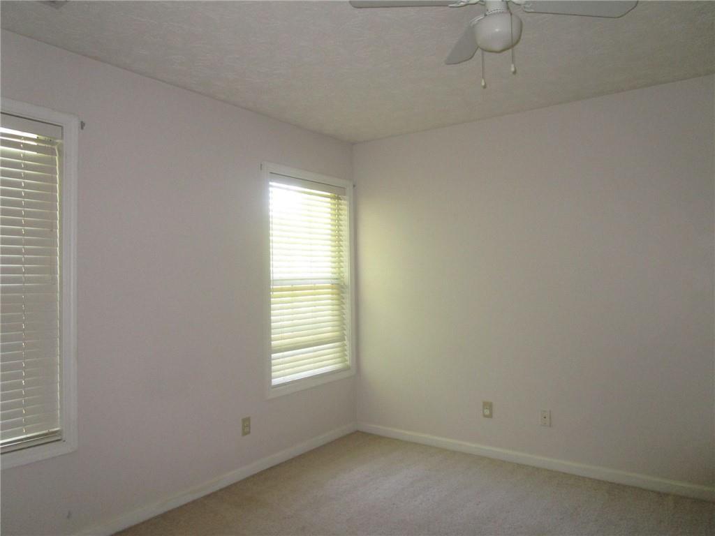 2825 Factor Walk Boulevard Suwanee, GA 30024 - Photo 20 of 25 an empty room with a window