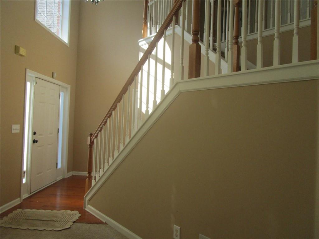 2825 Factor Walk Boulevard Suwanee, GA 30024 - Photo 24 of 25 a view of an entryway with wooden floor
