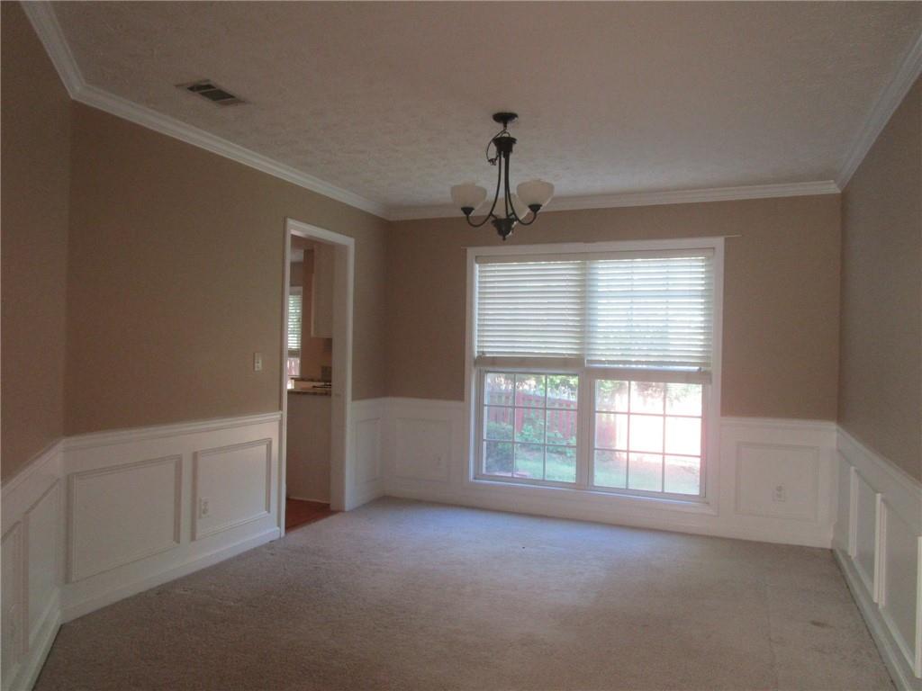 2825 Factor Walk Boulevard Suwanee, GA 30024 - Photo 4 of 25 a view of a livingroom with a window