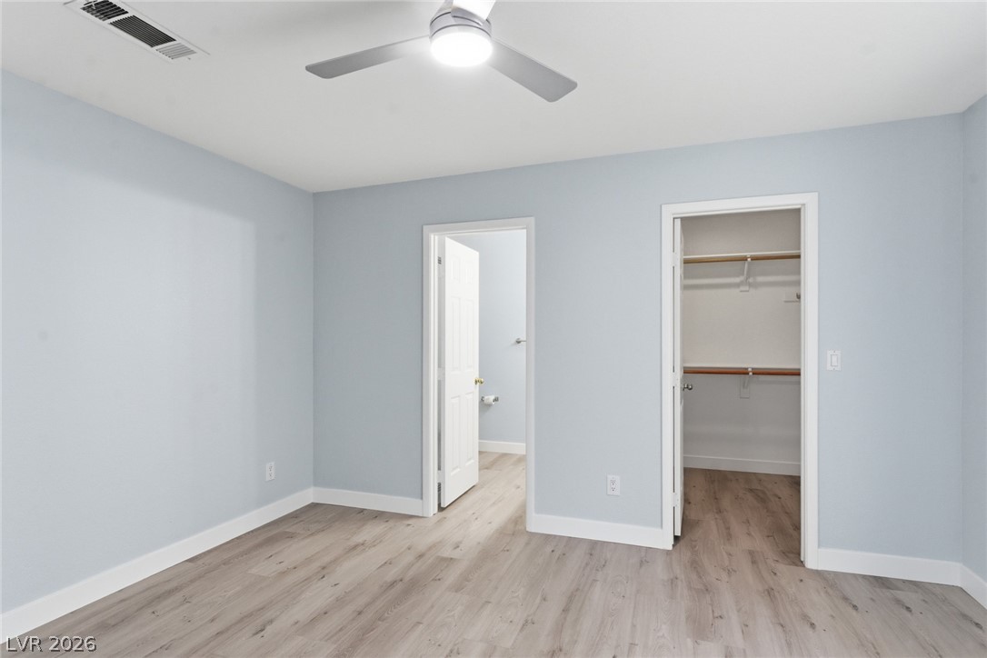 5449 Bugle Way, Unit 104 Las Vegas, NV 89108 - Photo 22 of 33 This bright room features light flooring, offering a fresh and inviting atmosphere.