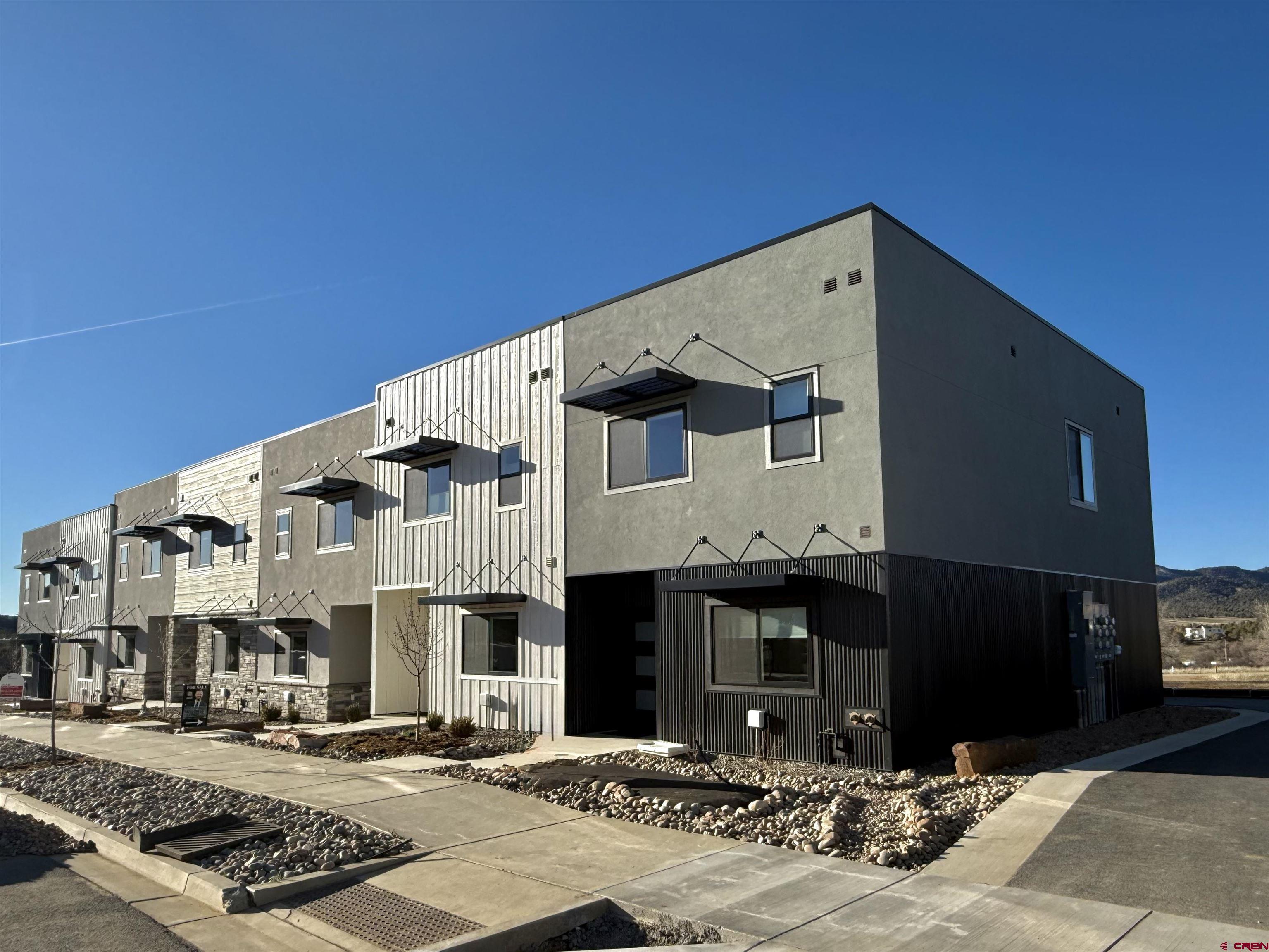 213 Treeline Street Durango, CO 81303 - Photo 25 of 41 a front view of a building with street