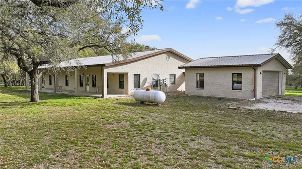 a view of a house with an outdoor space
